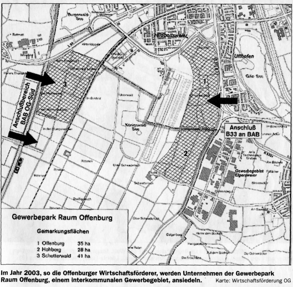 Schwarz-weiße Karte des Gewerbeparks Raum Offenburg, mit schraffierten Zonen für Offenbug, Hohberg und Schutterwald. Die wichtigsten Straßen, der Autobahnanschluss und die umliegenden Gebiete sind markiert. Deutscher Text am unteren Rand.